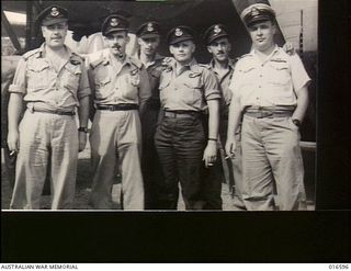 New Guinea. 1944-02-20. RAAF members are now flying American Liberator aircraft operating in New Guinea. Every state except Tasmania is represented in the Liberator crews. Left to right: Flying ..