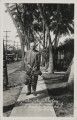 Mr. Nielen on his 86th birthday, bringing home the coconut crop