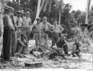 KIRIWINA, TROBRIAND ISLANDS, PAPUA. 1944-01-31. IN MODERN WARFARE, AERODROME DEFENCE IS VITAL AND THE RAAF HAS TRAINED A NUMBER OF "TOUGH GUYS" TO LOOK AFTER ITS POSSESSIONS. SERGEANT R. F. ..