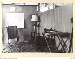 LAE AREA, NEW GUINEA, 1945-08-10. THE READING ROOM AT THE BUSU EDUCATION CENTRE UNDER THE COMMAND OF THE DEPUTY ASSISTANT DIRECTOR OF EDUCATION, LAE BASE SUB-AREA