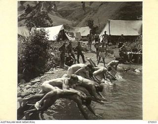 ZENAG, NEW GUINEA, 1944-02-27. THE START OF THE "LEAP FROG RACE", AT A SPORTS CARNIVAL HLED AT A CREEK DAMMED BY PERSONNEL OF THE 2/9TH FIELD COMPANY, ROYAL AUSTRALIAN ENGINEERS. THE CARNIVAL, ..