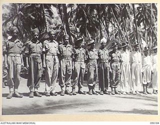 AITAPE, NEW GUINEA. 1945-03-29. A GROUP OF INDIAN SOLDIERS RESCUED FROM THE JAPANESE, RECUPERATING AT 104 CASUALTY CLEARING STATION AFTER MONTHS OF ILL- TREATMENT AS PRISONERS- OF- WAR. IDENTIFIED ..