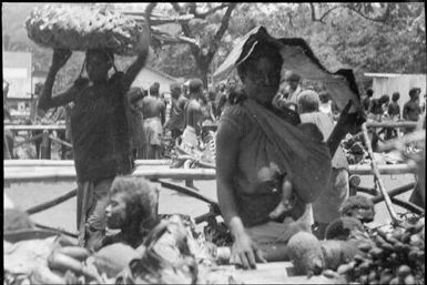 Native market with new trestle tables, Rabaul, New Guinea, ca. 1929 / Sarah Chinnery