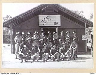 TOROKINA, BOUGAINVILLE. 1945-11-26. MEMBERS OF THE RADIO STAFF AT RADIO STATION 9AC TOROKINA, AUSTRALIAN ARMY AMENITIES SERVICE BROADCASTING STATION ON BOUGAINVILLE