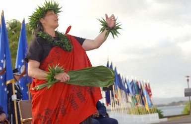 Carman Kaleihua Kanei, a Hawaiian Dancer performs a chant during a Memorial Service honoring the 30th Anniversary of Operation HOMECOMING, held at Hickam AFB, Hawaii (HI)