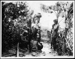 Samoan family in their front yard with water jugs, ca.1900
