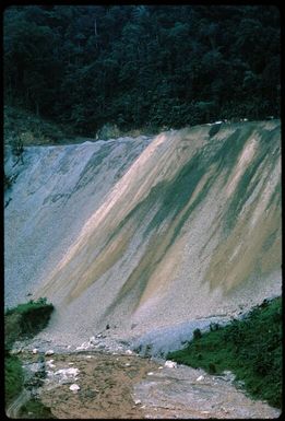 Disposing of the overburden: filling a valley, Arawa (3) : Bougainville Island, Papua New Guinea, April 1971 / Terence and Margaret Spencer