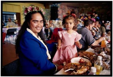 Alana (Kayne's auntie) and her daughter enjoy the feast at Kayne Lucas Upokokeu's hair-cutting ceremony