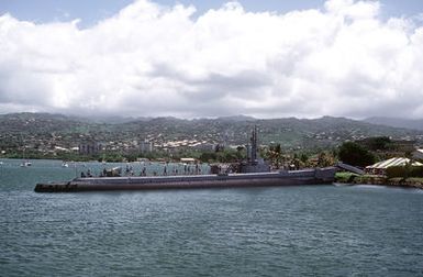 A starboard view of the submarine Ex-USS BOWFIN (SS-287). This World War II submarine is now a memorial ship