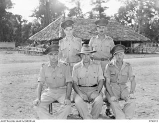 LAE, AREA, NEW GUINEA. 1944-11-18. OFFICERS OF THE 2/7TH ADVANCED WORKSHOPS. IDENTIFIED PERSONNEL ARE:- NX200523 LIEUTENANT R.A. RODGERS (1); NX169 CAPTAIN R. CROMITE (2); NX78450 LIEUTENANT J. ..