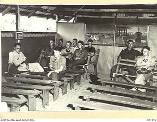 KOITAKI, PORT MORESBY AREA, PAPUA. 1944-03-26. THE AUDIENCE IN THE MUSIC HUT AT THE 113TH CONVALESCENT DEPOT VIEWING A MUSICAL RECITAL GIVEN BY AN AUSTRALIAN ARMY EDUCATION SERVICE UNIT ATTACHED TO ..