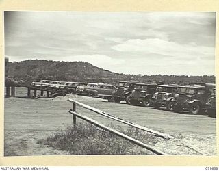 PORT MORESBY, PAPUA, NEW GUINEA. 1944-03-29. THE VEHICLE PARK AT TRANSPORT SECTION, HEADQUARTERS NEW GUINEA FORCE