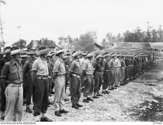 HELDSBACH MISSION, FINSCHHAFEN , NEW GUINEA. 1944-03-27. MEMBERS OF THE 2/3RD CASUALTY CLEARING STATION ON PARADE. IDENTIFIED PERSONNEL ARE: VX81243 CORPORAL H. F. WOOD (1); VX53808 PRIVATE (PTE) ..