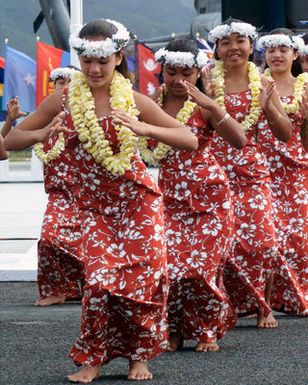 Hawaiian Dancers from the Halau Hula Olana dance group perform a hula dance during the Commander-in-CHIEF US Pacific Commands Change of Command Ceremony at, Marine Corps Base, Kaneohe Bay, Hawaii. During the Ceremony Admiral Dennis C. Blair relinquished his command to Admiral Thomas B. Fargo