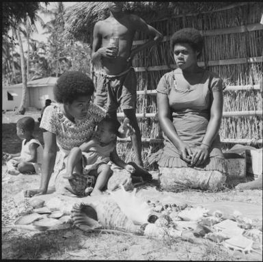 Young mother and daughter selling sea shells, Mana Island, Fiji, November 1966 / Michael Terry