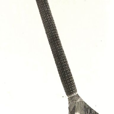 Photo of a carved adze (4310-2)