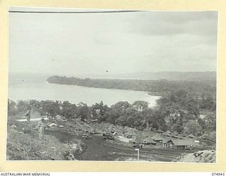 FINSCHHAFEN, NEW GUINEA. 1944-07-31. THE CAMP AREA OF THE 19TH LINES OF COMMUNICATION SIGNALS AT SCARLET BEACH SEEN FROM NORTH HILL