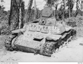 WEWAK AREA, NEW GUINEA, 1945-05-28. A KNOCKED OUT JAPANESE TYPE 97 CHI-HA ENGINEER RECOVERY TANK WHICH WAS FOUND NEAR BORAM IN THE HQ 6 DIVISION AREA