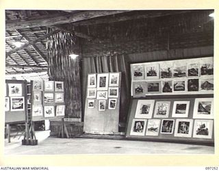 LAE, NEW GUINEA. 1945-09-11. AN EXHIBITION OF WORKS BY MEMBERS OF THE LAE ART GROUP AT THE CHARING CROSS EDUCATION CENTRE, ARRANGED BY THE AUSTRALIAN ARMY EDUCATION SERVICE. THE EXHIBITS INCLUDED ..