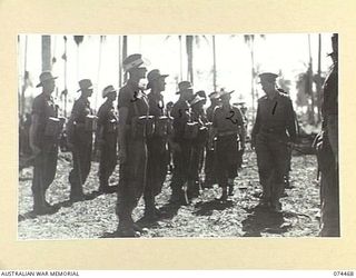 MADANG, NEW GUINEA. 1944-07-02. VX24325 BRIGADIER H.H.HAMMER, DSO, COMMANDING, 15TH INFANTRY BRIGADE (1) INSPECTING PERSONNEL OF THE 24TH INFANTRY BATTALION. IDENTIFIED PERSONNEL ARE:- VX113767 ..