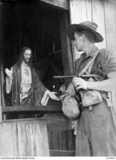 ALEXISHAFEN, NEW GUINEA, 1944-05-18. "THE SACRED HEART OF JESUS CHRIST", IN A CHAPEL AT THE YELBECK MISSION WHICH LIES NORTH OF ALEXISHAFEN. THE FIGURE WAS HIDDEN BY NATIVES IN A SAFE PLACE DURING ..