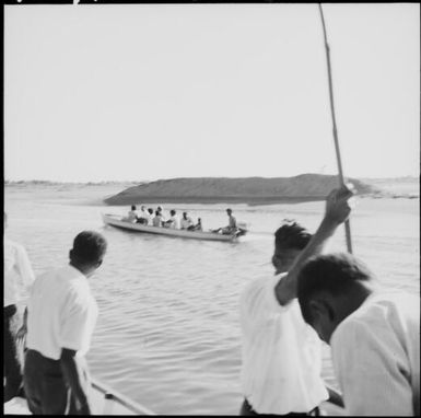 Fijian men in boats, Nasalai, Fiji, 1966 / Michael Terry