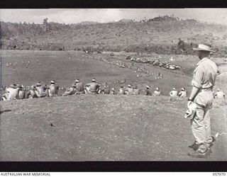 DONADABU, NEW GUINEA. 1943-09-19. GENERAL VIEW OF A RUGBY FOOTBALL MATCH BETWEEN THE 2/1ST AUSTRALIAN TANK ATTACK REGIMENT AND THE 61ST AUSTRALIAN INFANTRY BATTALION