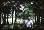 Portrait of a man with forest in the background