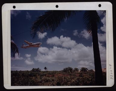 A Douglas C-54 Takes Off From Harmon Field, Guam. Usaf Photo Taken 4-13-45 By Q. R. Porter On Pacific Press Tour. (U.S. Air Force Number K4239)