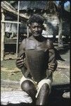 Man holding pottery