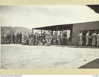 PORT MORESBY, PAPUA, NEW GUINEA. 1944-03-29. MEMBERS OF THE TRANSPORT SECTION, HEADQUARTERS NEW GUINEA FORCE, AT THE UNIT'S MESS PARADE