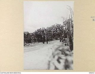 WIRUI BEACH, WEWAK AREA, NEW GUINEA. 1945-08-25. A GENERAL VIEW OF THE CAMP AREA, 2/11 INFANTRY BATTALION. THE CAMP IS ON THE BEACH AND HAS BEEN LOCATED THERE SINCE COMING OUT OF ACTION IN THE ..