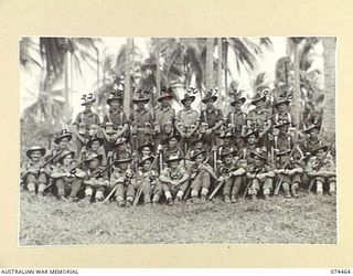 MADANG, NEW GUINEA. 1944-07-03. PERSONNEL OF NO. 5 PLATOON (PIONEERS) HEADQUARTERS COMPANY, 24TH INFANTRY BATTALION. IDENTIFIED PERSONNEL ARE:- VX104469 PRIVATE D.A. MANN (1); V32392 PRIVATE W.G. ..