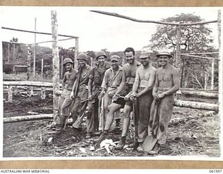 DREGER HARBOUR, NEW GUINEA. 1943-12-04. MEN OF THE 808TH UNITED STATES AVIATION ENGINEER BATTALION WHO HELPED TO BUILD THE NEW AIRSTRIP