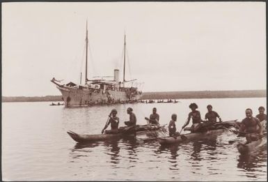 Santa Cruz people in canoes gathered around the Southern Cross for trade, Santa Cruz Islands, 1906 / J.W. Beattie