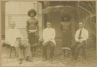 Government Printing Office staff, Bennett, machinist, Baker, government printer, and Bock, foreman, compositor, Papua, February, 1914