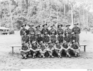 Group portrait of members of 14 Platoon, C Company, 58/59 Infantry Battalion. Identified, back row, left to right: Private (Pte) F O'Donnell; Lance Corporal (L Cpl) S Vyner; Staff Sergeant H Doyle; ..