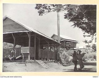 NAMANULA, RABAUL, NEW BRITAIN, 1945-10-15. THE JAPANESE LIAISON OFFICE (FRONT) AND VISITOR'S HUT (REAR). THE BUILDINGS ARE SITUATED IN THE GENERAL OFFICER COMMANDING'S AREA, HEADQUARTERS 11 ..