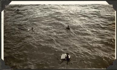 Four people swimming in the water, Samoa, 1929 / C.M. Yonge