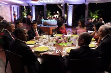 Barack Obama and Michelle Obama attend the Leaders Dinner at the APEC summit in Honolulu, Hawaii, November 12, 2011