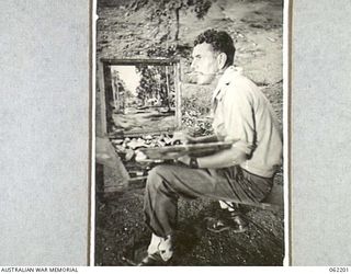 PORT MORESBY, PAPUA, NEW GUINEA. 1943-01-18. SX13471 SERGEANT G. R. MAINWARING, OFFICIAL WAR ARTIST, AUSTRALIAN MILITARY HISTORY SECTION, ATTACHED TO HEADQUARTERS, NEW GUINEA FORCE