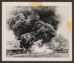 [Tank Using Flamethrower Against Japanese Fortification in Saipan]