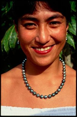 Woman wearing black pearl necklace, Rarotonga