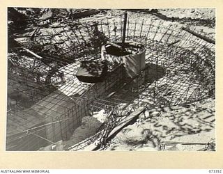 PORT MORESBY, NEW GUINEA. 1944-05-24. THE NO.3 GUN BED UNDER CONSTRUCTION AT BASILISK BATTERY, 801ST ANTI-AIRCRAFT AND COAST ARTILLERY BATTERY, HEADQUARTERS MORESBY BASE SUB-AREA VIEWING THE ..