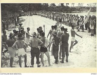 KELANOA, NEW GUINEA, 1944-02-20. THE 5TH DIVISION SIGNALS TEAM WINNERS OF THE MARCHPAST AT THE MOST FORWARD BEACH CARNIVAL HELD IN NEW GUINEA. THE CARNIVAL WAS ORGANISED BY CAPTAIN A.E. RICHARDS ..