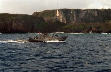 A port bow view of a PB Mark III patrol boat underway in the harbor