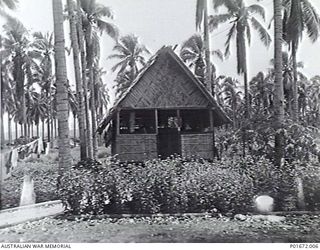 LUNGGA, GUADALCANAL, SOLOMON ISLANDS, 1944-02-29. THE CABIN WHICH SERVED AS THE LIVING QUARTERS FOR LIEUTENANT COMMANDER D.S. MACFARLANE, DEPUTY SUPERVISING INTELLIGENCE OFFICER (DSIO), NAVAL ..