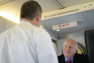 Vice President Cheney Talks with David Addington Aboard Air Force Two En Route to Guam