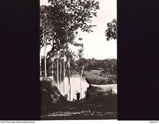 TAVERI RIVER, NEW GUINEA, 1943-09-05. LOOKING DOWN THE RIVER FROM GRIM POINT, ABOUT TWO MILES BELOW THE JUNCTION OF THE LAKEKAMU AND TAVERI RIVERS. GRIM POINT IS THE MAIN STAGING POINT BETWEEN ..