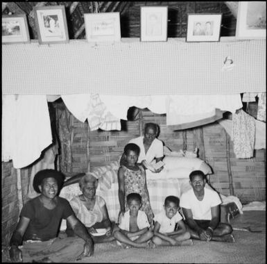 Fijian family inside a hut, Fiji, 1966, 1 / Michael Terry